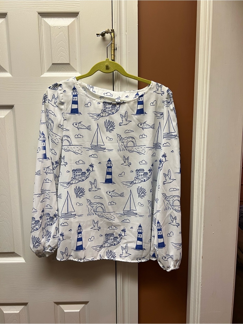 Long-Sleeve White Top with Blue Nautical Print